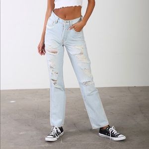 Ripped Light-Washed Blue Jeans